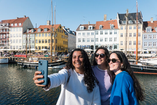friends enjoy and take a selfie in copenhagen