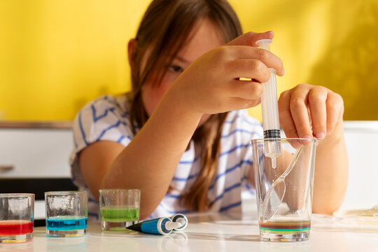kid working on a science experiment