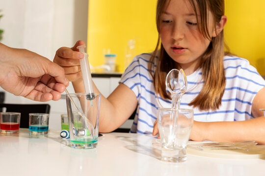 kid working on a science experiment