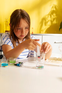 kid working on a science experiment