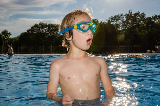 boy with goggles in a pool in oslo