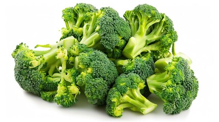  White broccoli stacked on white surface against white backdrop