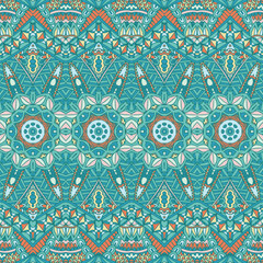 Abstract ethnic festive pattern for fabric. Geometric doodle colorful seamless pattern ornamental.