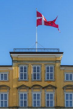 Frederiksberg palace with the flag of denmark flying on top