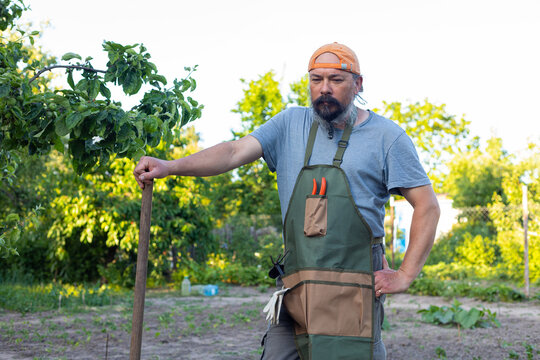portrait of a man with a shovel