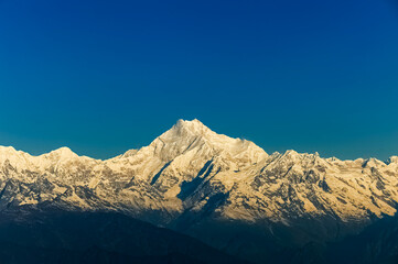Beautiful first light from sunrise on Mount Kanchenjugha, Himalayan mountain range, Sikkim, India....