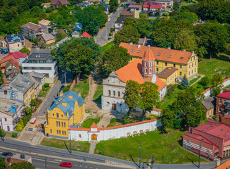 Kaunas Benedictine Church of Saint Nicholas in old town, Lithuania. Panoramic drone aerial view...