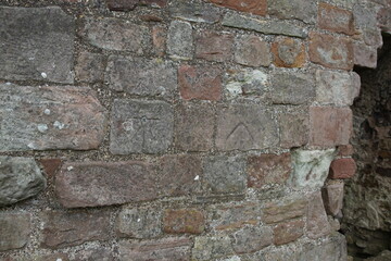Markings on the keep wall at Brough Castle, a ruin in the village of Brough in Cumbria, England, UK The castle was built by Norman's around 1092 within the old Roman fort of Verterae