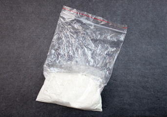 Bag of white narcotic substance. ZIP bag transparent with white powder, narcotic substance.