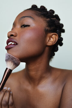 Using makeup brush