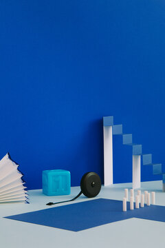 A minimalistic still life with a paper ladder
