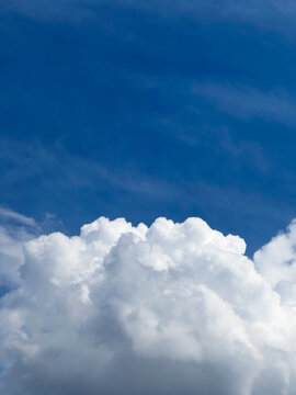 Fluffy white cloud and blue sky