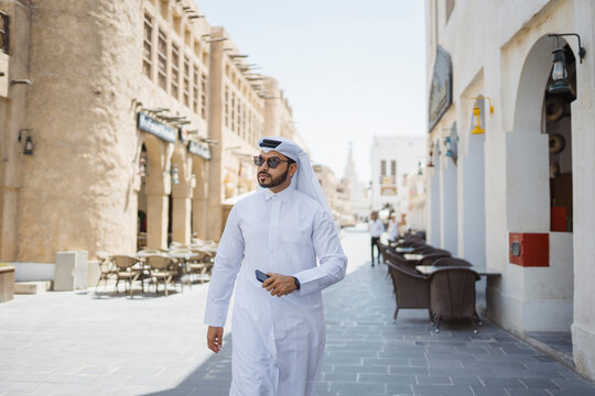 Man Walking in Souq Waqif