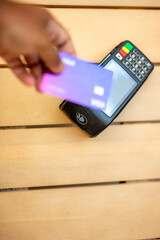 Effortless Checkout. Man Paying with a Credit Card