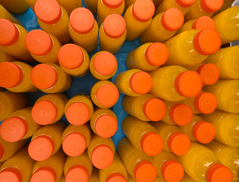 bottles with orange juice