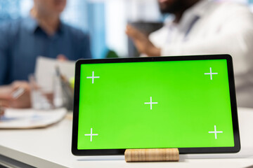 Broker and senior couple discussing financial investment plan in modern office, using copy space screen. Specialist showing life insurance ways of securing their savings for retirement.