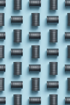 Black drums laying on side and creating chess order in vertical rows