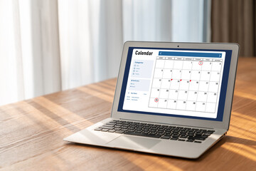 Fototapeta premium Calendar on computer software application for modish schedule planning for personal organizer and online business