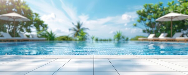 Fototapeta premium Beautiful white ceramic tile table top with a blurred background of an outdoor swimming pool and lounge chairs for product display or montage your products on it Generative AI