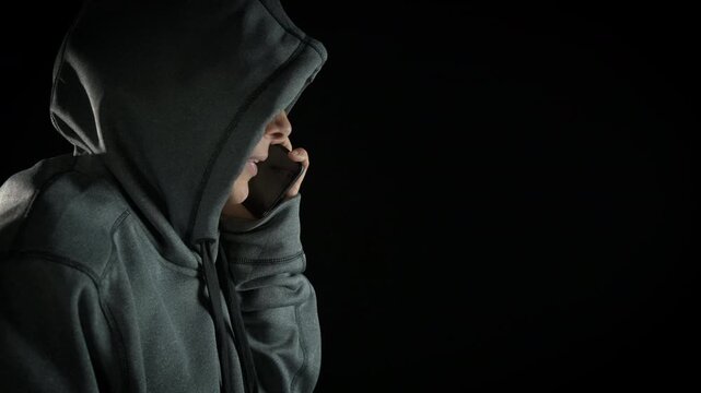 Female during cyber work on phone. A cyber police catch the female speaking on phone during steal personal data.