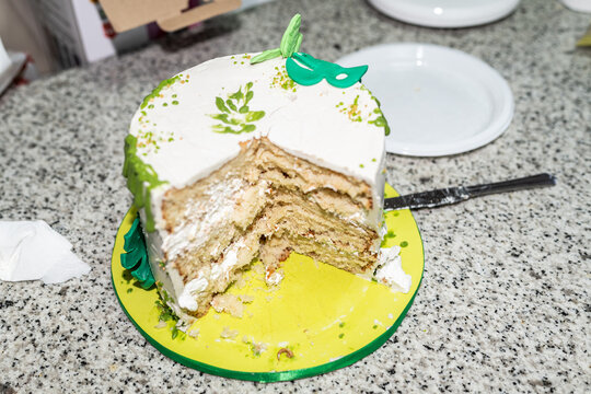 Partially eaten delicious birthday cake
