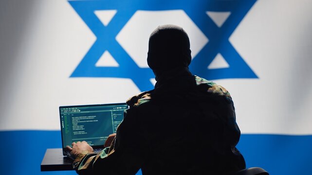 Israel intelligence agency operator uses program deploying bots on social networks, smearing political opponents. Israeli Mossad agent engages in cognitive warfare using troll accounts, camera A