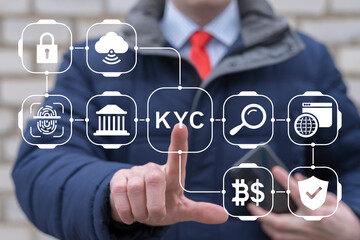 Business man using virtual touch screen presses text: KYC. Concept of KYC Know Your Client. E-KYC Marketing Customer Identification Technology.