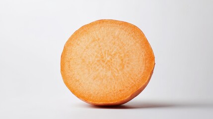 Cross-section of a sweet yam, with the smooth, rich orange flesh clearly visible. The texture and freshness highlighted on a white background