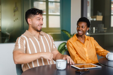 Businesspeople During Coffee Break In Modern Office