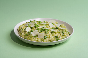 Green Pea Risotto on a Green Background