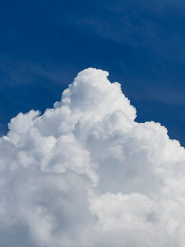 Fluffy white cloud and blue sky