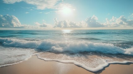 Panoramic shot of a sandy beach, featuring rolling sea waves and a tranquil shoreline under the sun.