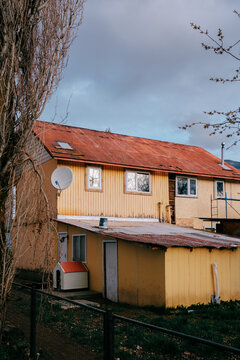 Yellow house with red roof