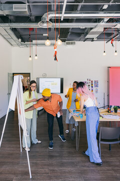 Creative multi-ethnic team collaborating on a brainstorming session