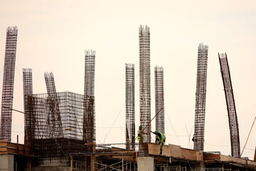 construction of multi-storey buildings, installation of reinforcement and formwork for casting...