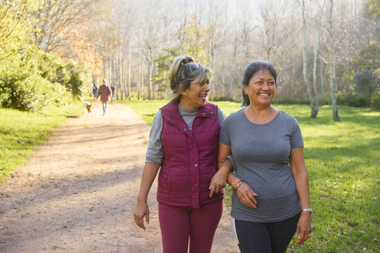 fitness friends walk outdoors