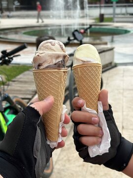 Son and Father Bike Riders Eating Ice Cream
