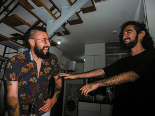 Friends Laughing at House Party