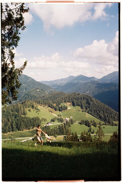 Father playing with his son in slovenian hills