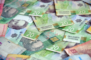 Processed collage of Ukrainian Hryvnia UAH bills banknotes texture. Background for banner