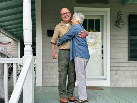 Senior Citizen military Veteran Portrait UGC home porch with wife 