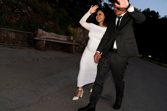 paparazzi style portrait of stylish couple