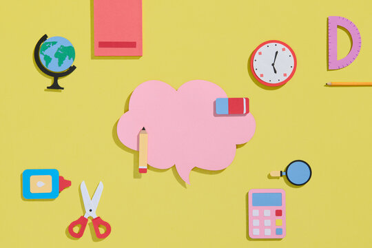 Composition with blank speech bubble and different school