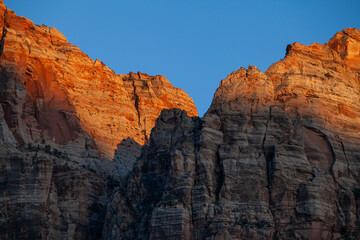 Striated red canyon rock walls in Zion National Park