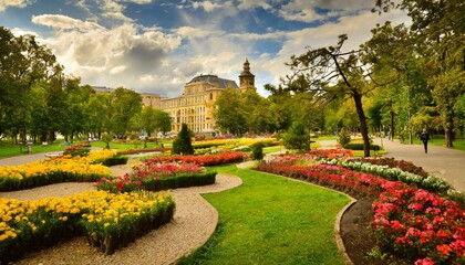 Obraz premium Vibrant City Park with Colorful Flower Beds