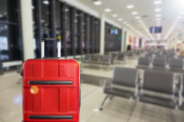 Travel suitcases in airport hall waiting for vacation