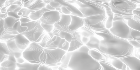 Realistic water surface overlay. Transparent background with detailed ripples and caustic light effects on a water surface. PNG file.