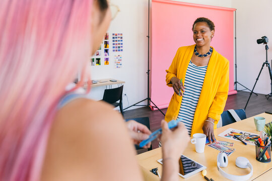 Creative professionals collaborating in a vibrant office space
