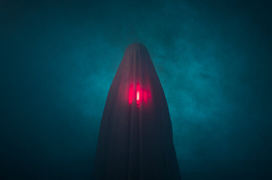 Cinematic ghost in the fog with red light