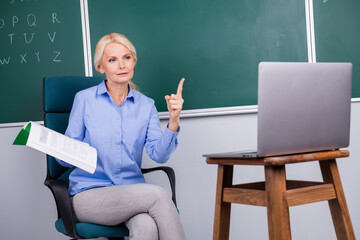 Photo of qualified confident woman school teacher tell information lesson explain materials college school
